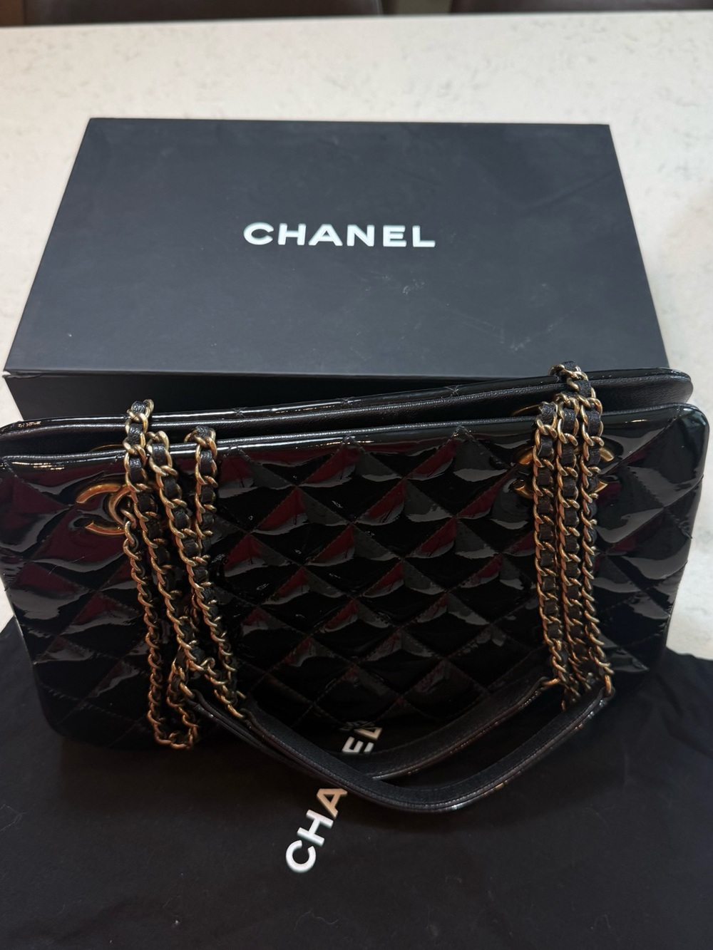 CHANEL Black Patent Quilted Shoulder Bag with Gold-Tone Chain